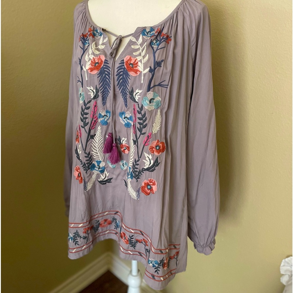 Beautiful Boho blouse with pretty embroidered detail and tassels.